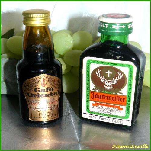 *****TWO COLLECTIBLE  miniature/small  GERMANY,  SEALED AND FULL LIQUEURS*****