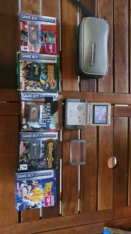 Used Gameboy advance sp. with magnifying screen and 4 games