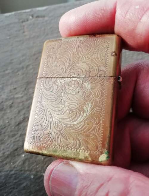 VINTAGE ZIPPO LIGHTER, AND LEATHER POUCH