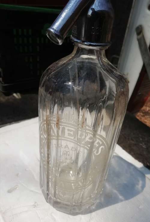 SCHWEPPES SODA WATER BOTTLE.