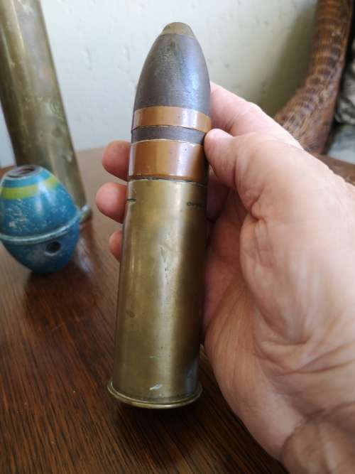 DEACTIVATED MILITARIA SHELLS. AND GRENADE.