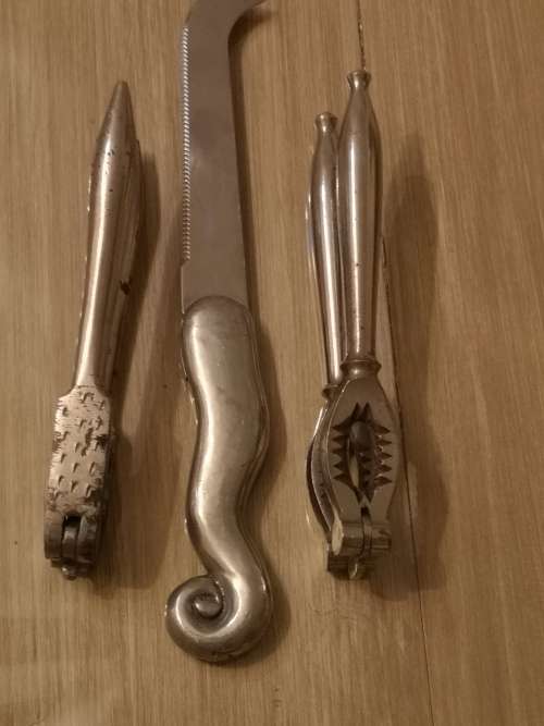 CAROL BOYES KNIFE AND TWO NUTCRACKERS.