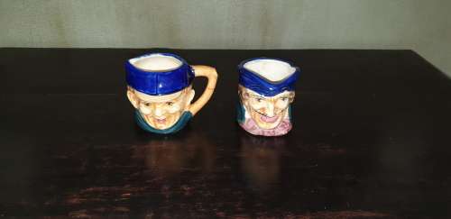 Set of two small Toby Jugs