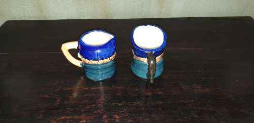 Set of two small Toby Jugs