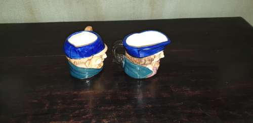 Set of two small Toby Jugs