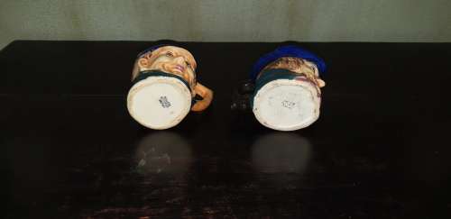Set of two small Toby Jugs