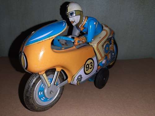 Vintage tin friction motorcycle
