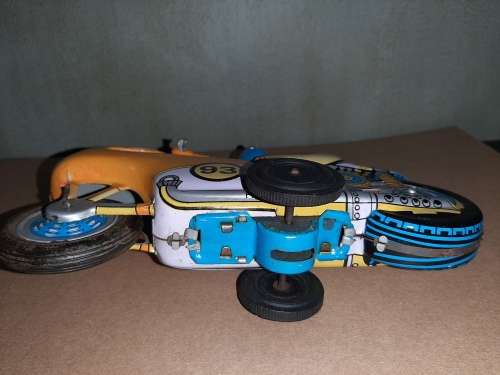 Vintage tin friction motorcycle