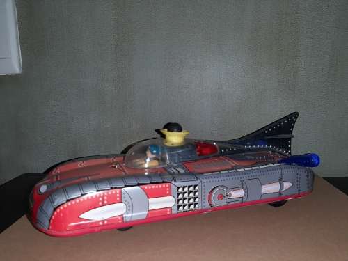 Vintage space rocket tin toy