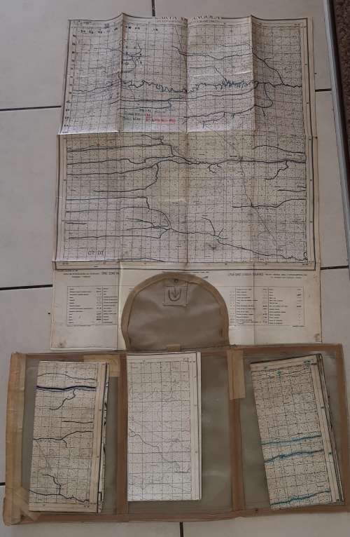 Old military stationery and map bag with maps