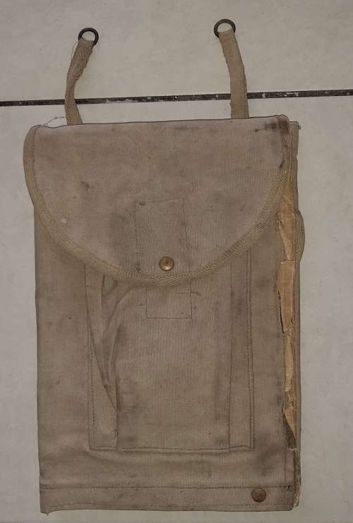 Old military stationery and map bag with maps