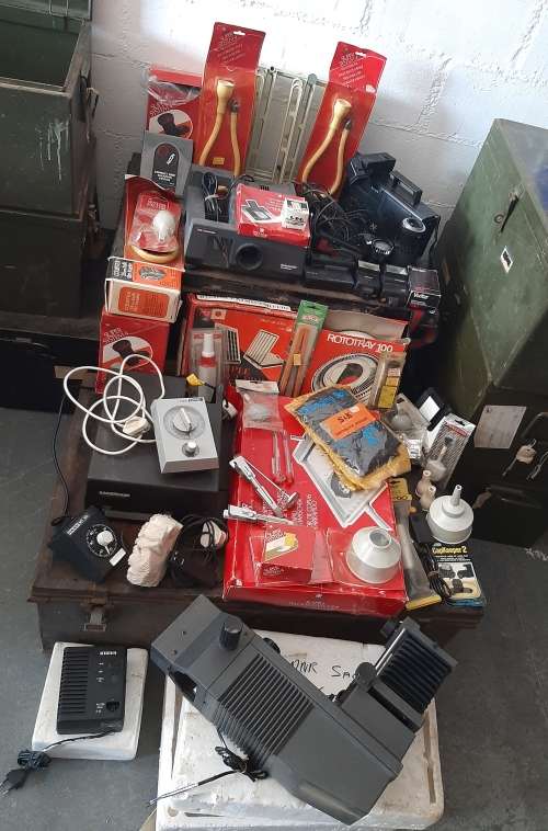 Vintage photographic equipment in military trunk