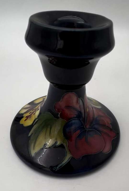 Moorcroft Hibiscus pattern piano candlesticks, blue ground, circa 1960s