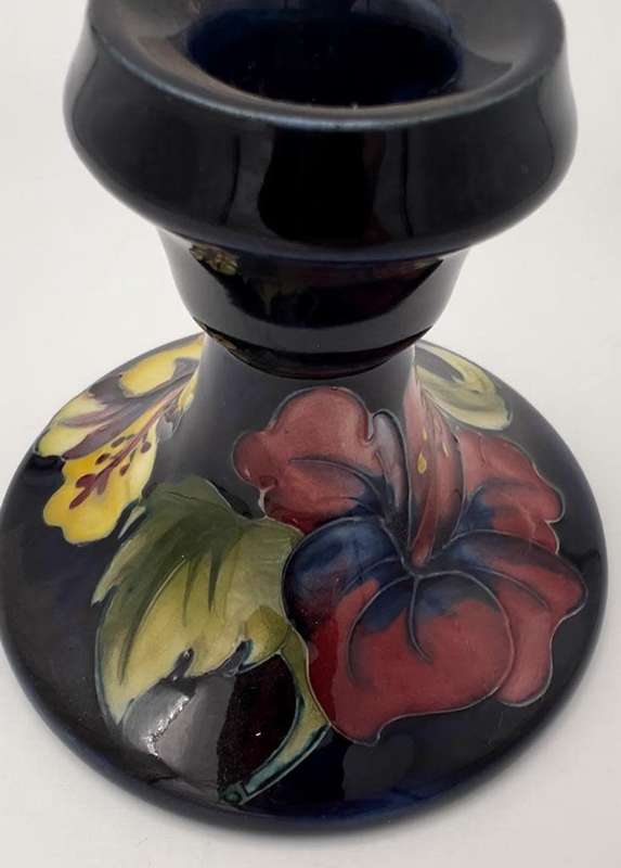 Moorcroft Hibiscus pattern piano candlesticks, blue ground, circa 1960s