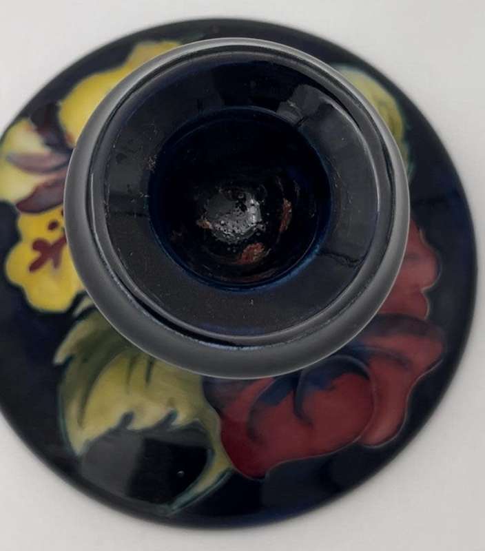 Moorcroft Hibiscus pattern piano candlesticks, blue ground, circa 1960s