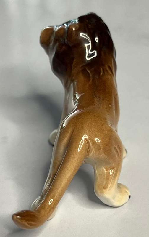 Lion and dog figurine