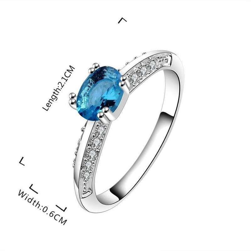 **Classic Oval Aquamarine Gold Diamond Engagement Ring**