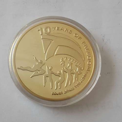 10 years of freedom Gold clad coin