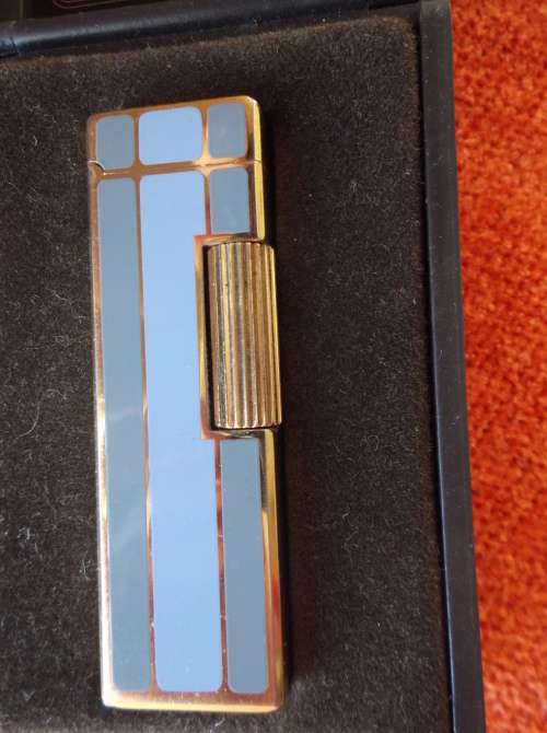 Stunning WIN Lighter in box.