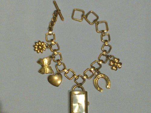 TEMPO ladies gold watch - with 5 charms
