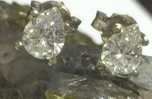 Pear shaped diamond stud earrings