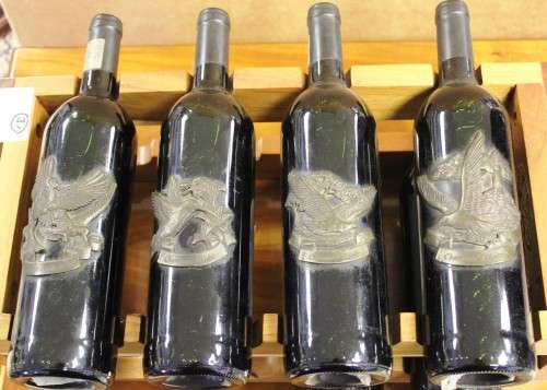 ERNIE Els winery set of 4 GOLF WINE bottles on a rack