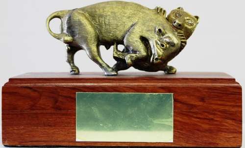 HANDMADE plated `Bull and Bear` carving mounted on a wooden block