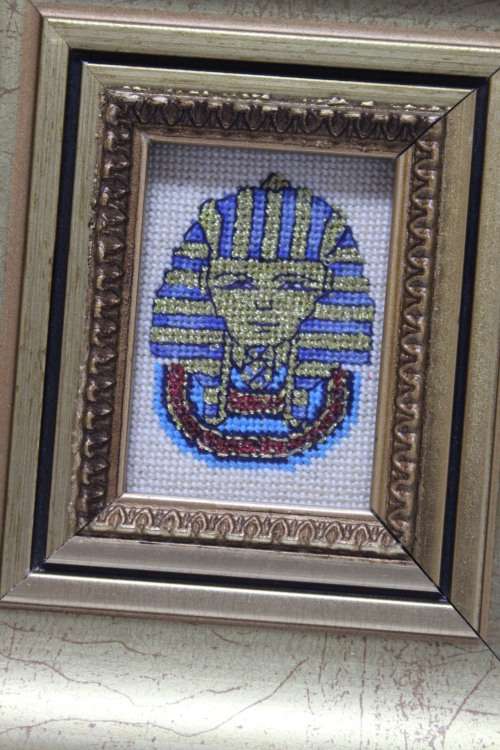 Small framed Egyptian artwork done in beads