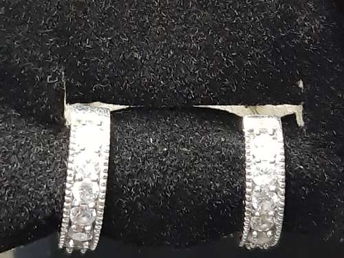 Sterling silver huggies with zirconias