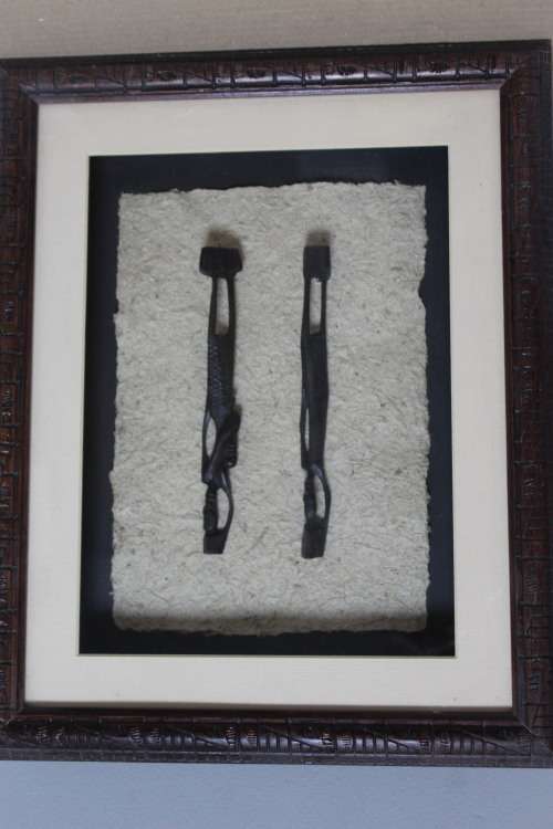 Box framed African wooden carvings