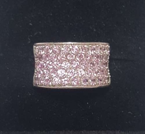 Sterling sliver thick half eternity ring, set with semi precious small pink stones