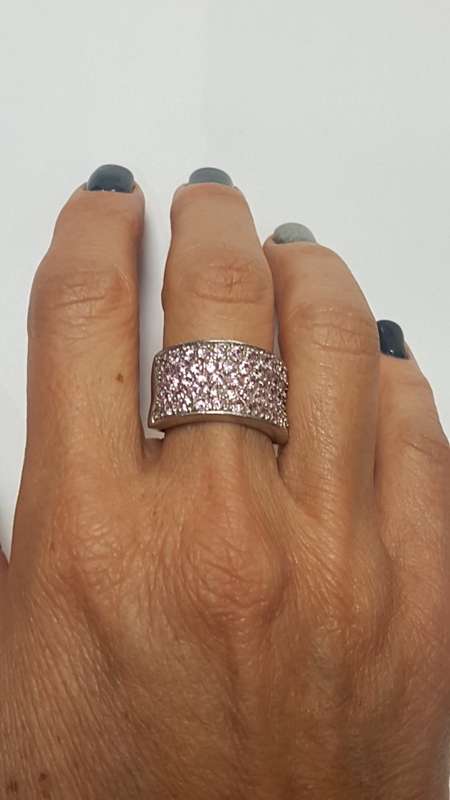 Sterling sliver thick half eternity ring, set with semi precious small pink stones