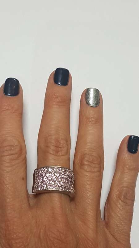Sterling sliver thick half eternity ring, set with semi precious small pink stones