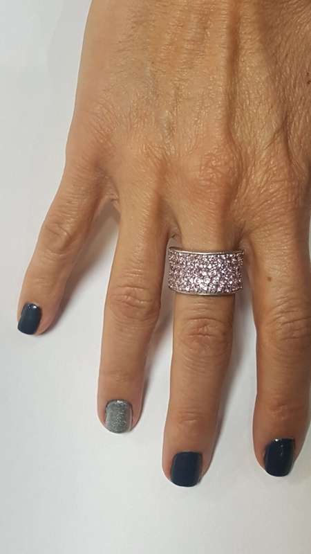 Sterling sliver thick half eternity ring, set with semi precious small pink stones