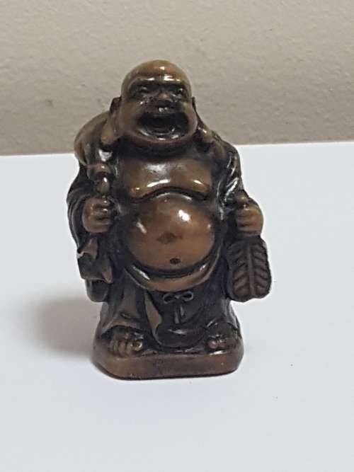 4 x piece Buddha figurine set