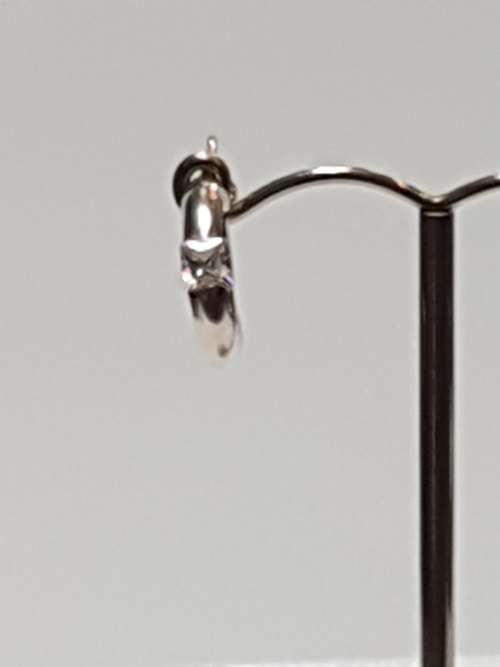 Sterling silver round earrings with 1 x princess zirconia in each