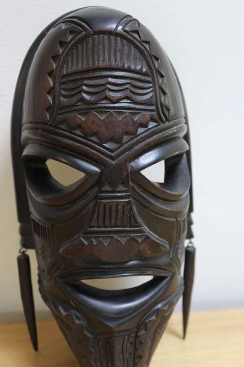 Central African carved wooden mask - There is a slight scuff mark on the head/top