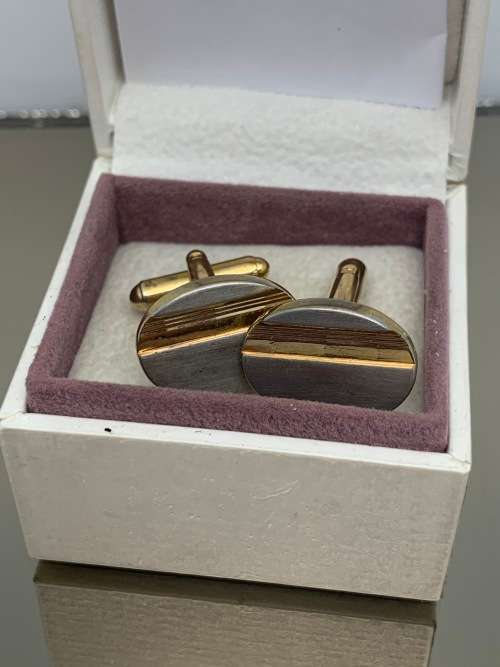 Stainless steel men`s cufflinks with gold colour