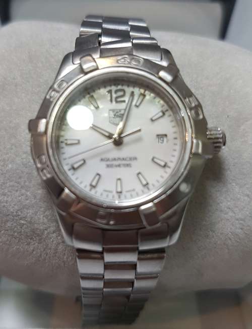 Tag Heuer lady`s c/w Mother of Pearl face - slight kink in the strap - Authenticated