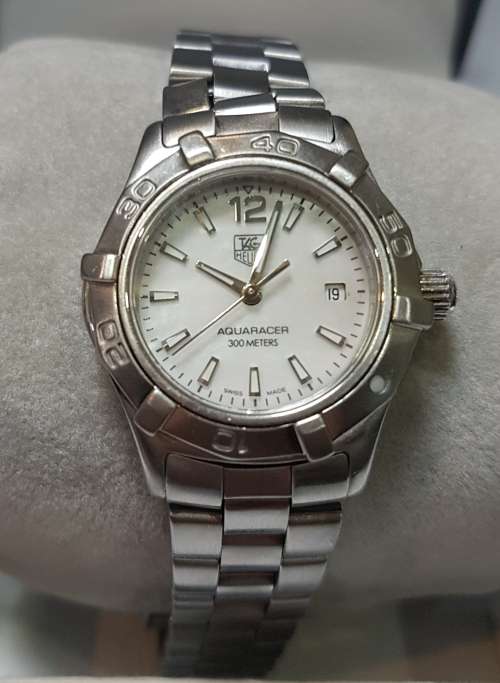 Tag Heuer lady`s c/w Mother of Pearl face - slight kink in the strap - Authenticated