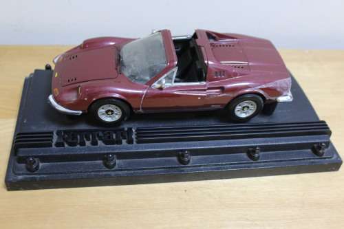 Collectible mini Ferrari - not in mint condition - can be used for spare parts