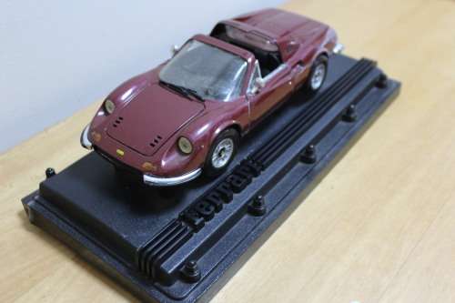Collectible mini Ferrari - not in mint condition - can be used for spare parts