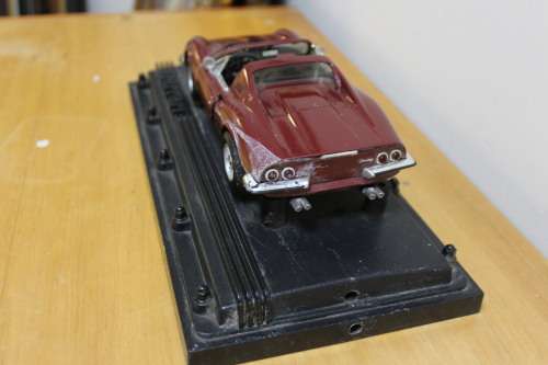 Collectible mini Ferrari - not in mint condition - can be used for spare parts