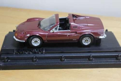 Collectible mini Ferrari - not in mint condition - can be used for spare parts