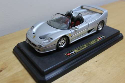 Collectible Burago mini Ferrari F50 - not in mint condition - can be used for spare parts