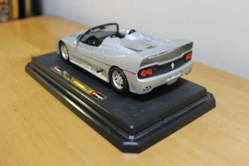 Collectible Burago mini Ferrari F50 - not in mint condition - can be used for spare parts