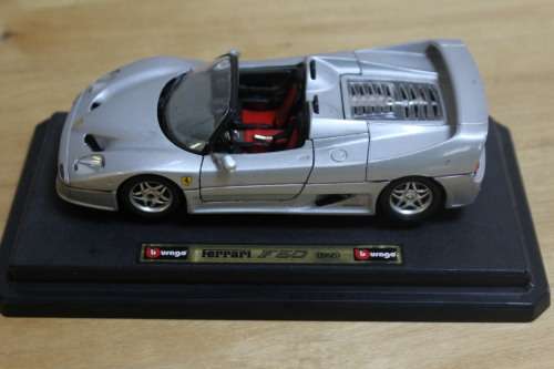 Collectible Burago mini Ferrari F50 - not in mint condition - can be used for spare parts