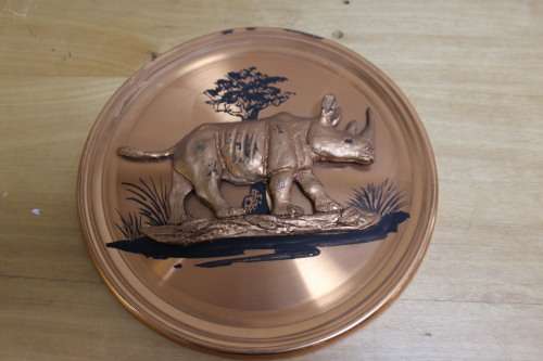 Small collectible plaque of a Rhino