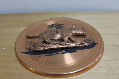 Small collectible plaque of a Rhino