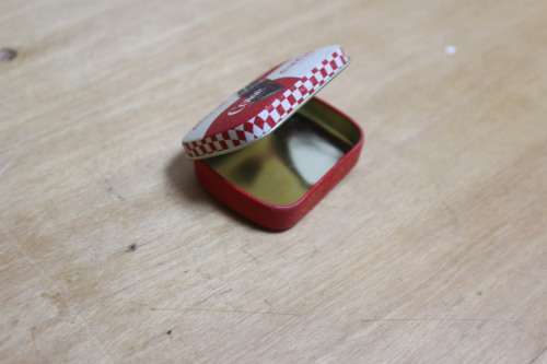 Collectible Coca-Cola memorabilia - small vintage container
